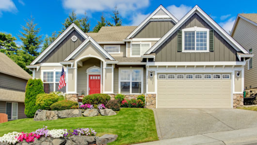 American house with beautiful landscape and vivid flowers American house with beautiful landscape and vivid flowers